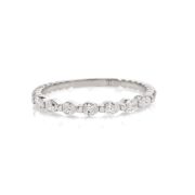 Doretto Doretto in oro bianco con sette Diamanti